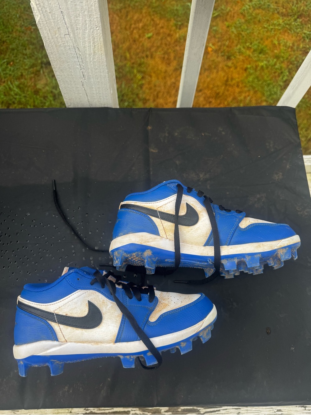 Men size 7 Blue and White Nike Air Force Cleats with Black Swoosh